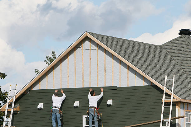 Professional Siding technician working in Larimer, PA